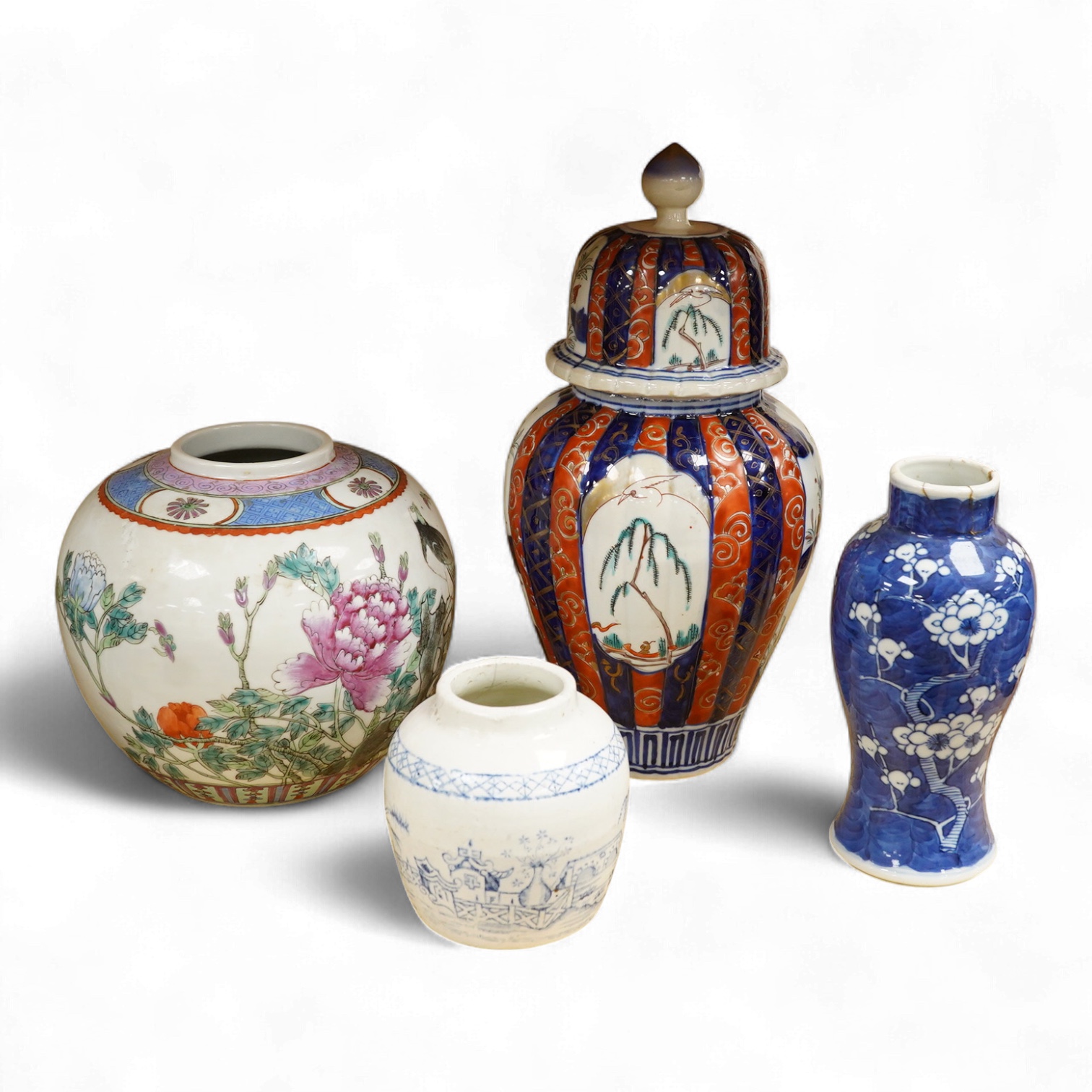 An Imari vase and cover-28cm high, a Chinese jar and prunus vase and a small blue and white jar.